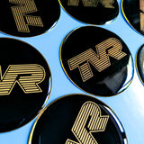TVR black & silver / gold / white resin domed steering wheel badge