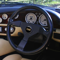 TVR black & silver / gold / white resin domed steering wheel badge
